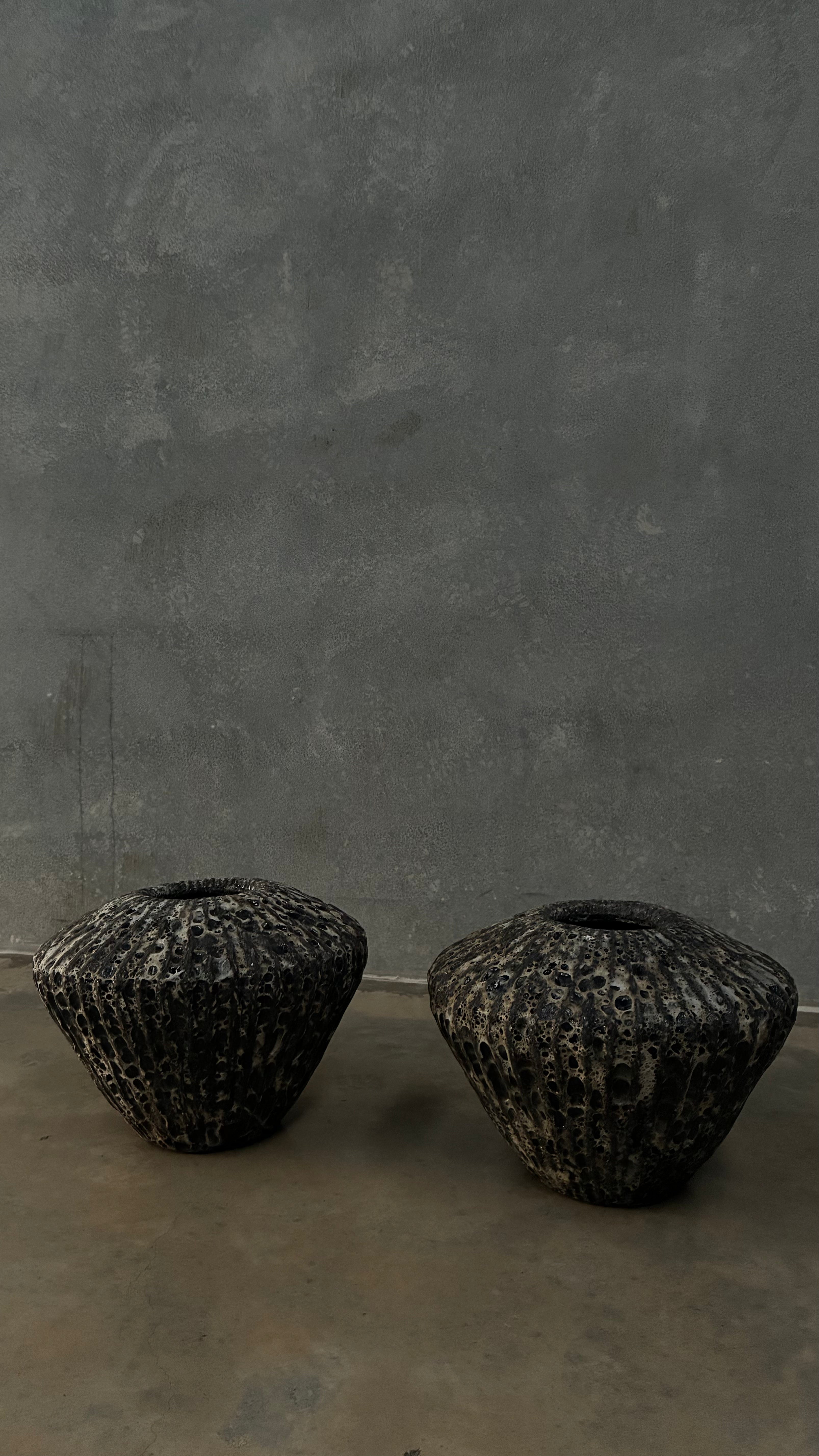 Pair of Volcanic Vessels