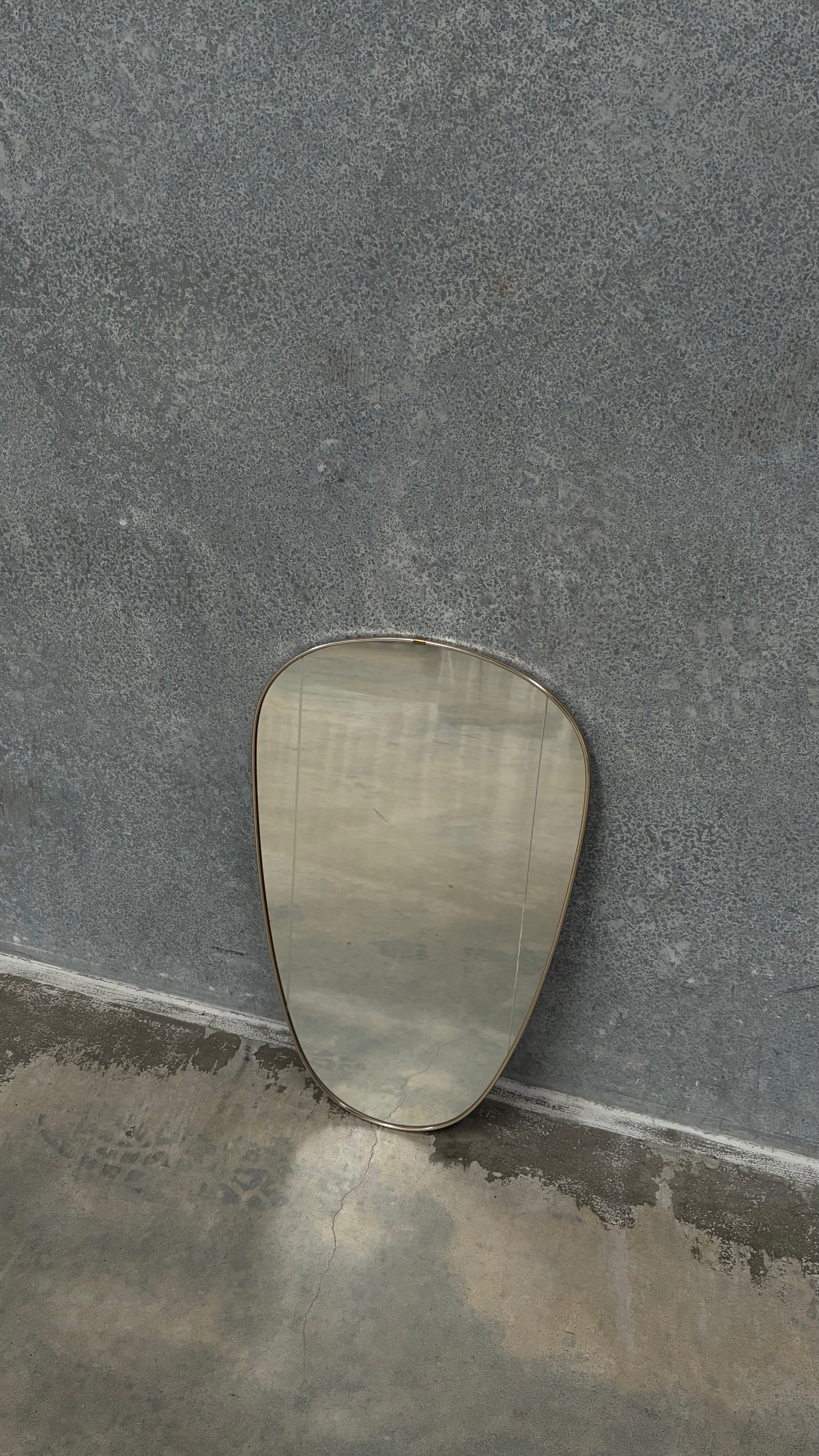 Brass Kidney Mirror with faceted Glass Detail 1950s
