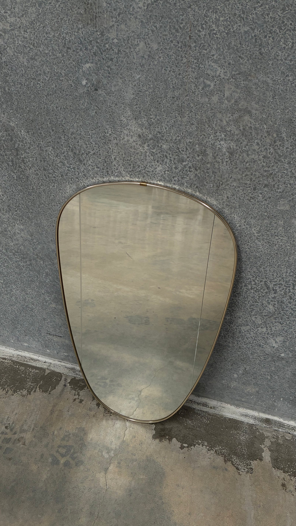 Brass Kidney Mirror with faceted Glass Detail 1950s