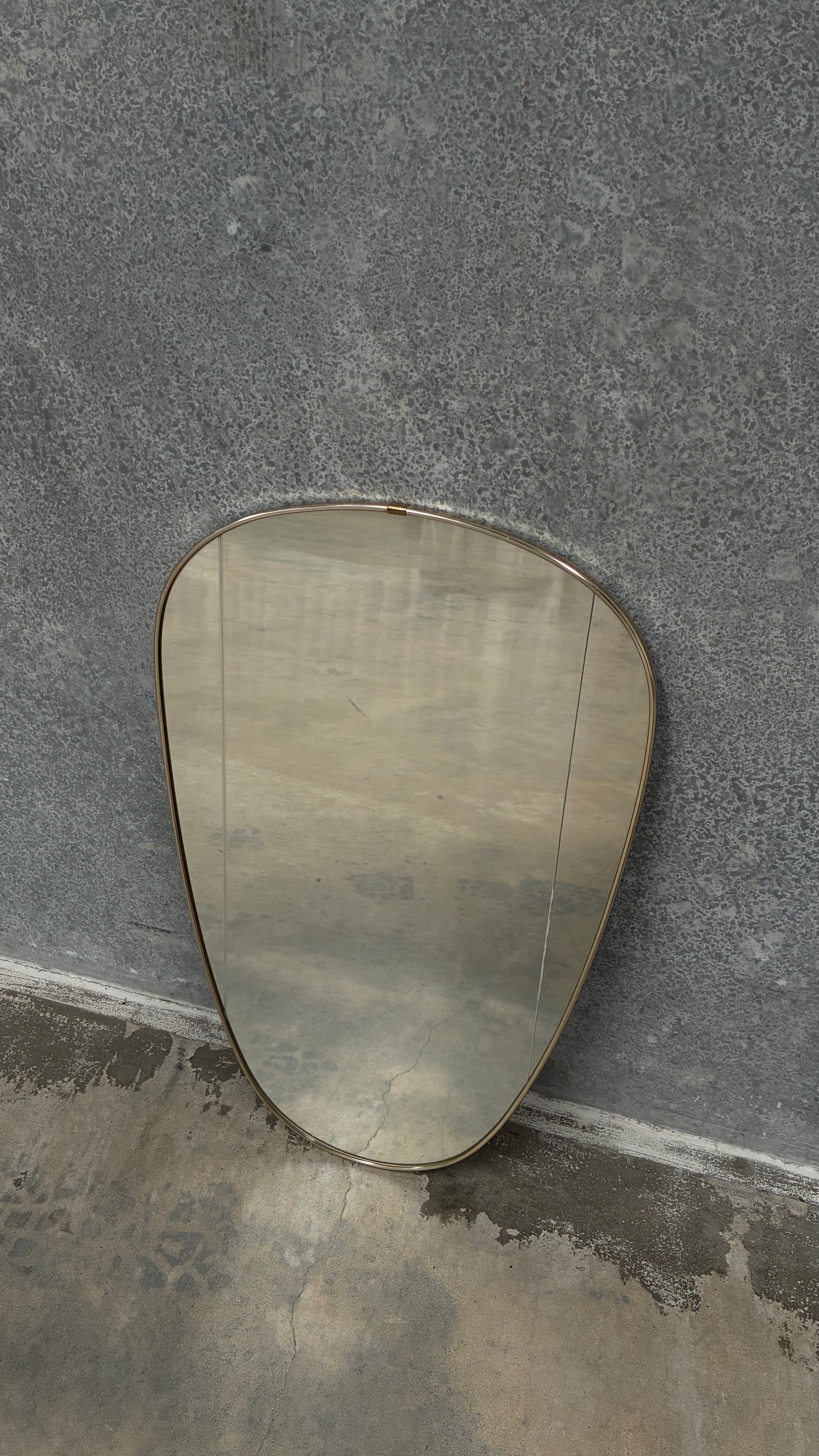 Brass Kidney Mirror with faceted Glass Detail 1950s
