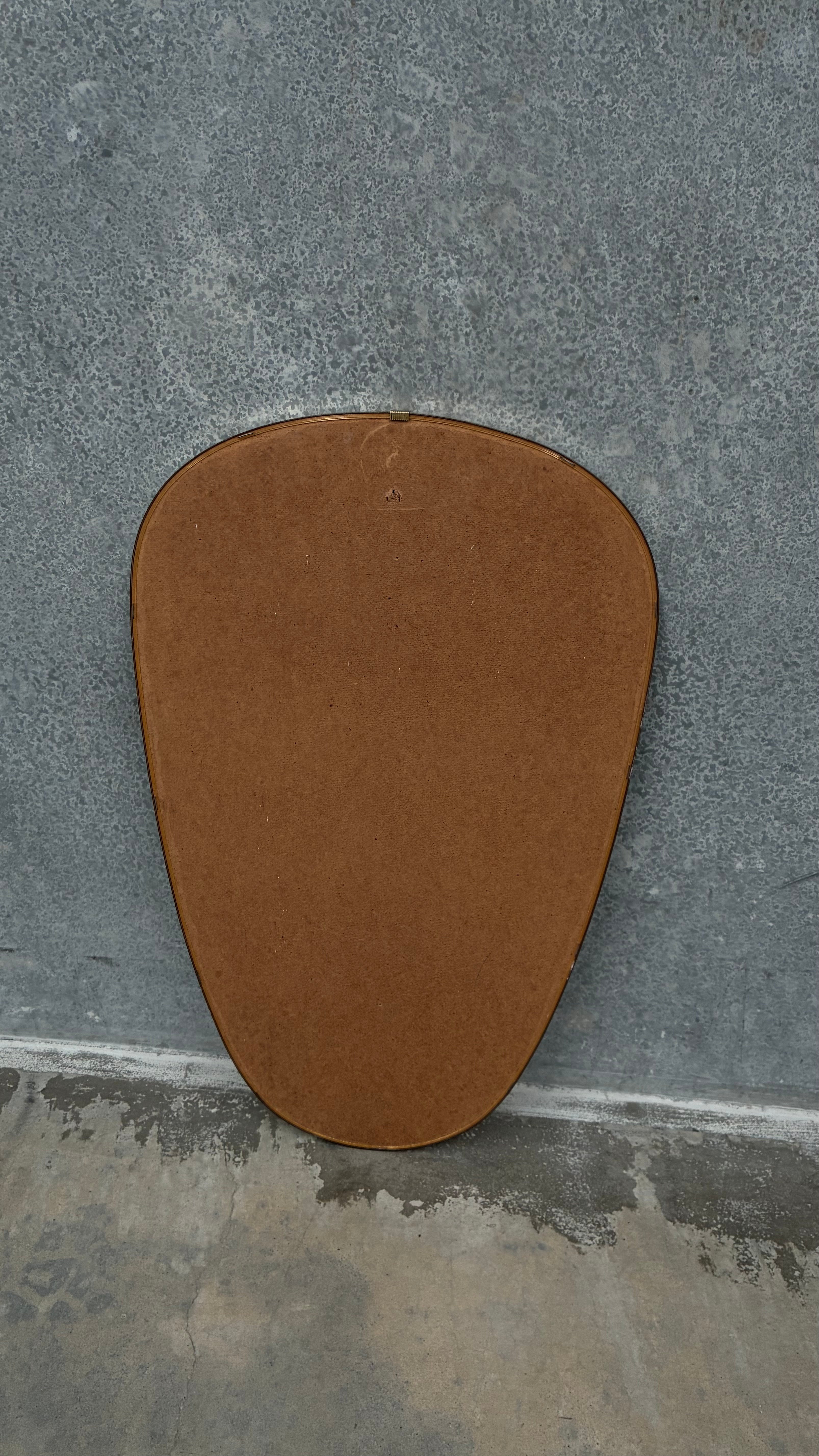 Brass Kidney Mirror with faceted Glass Detail 1950s