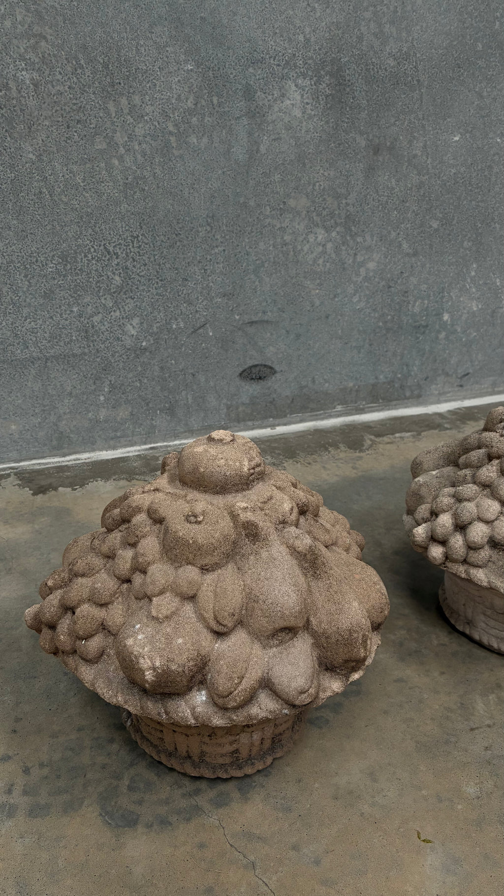 Pair of cast Stone fruit Basket Finials