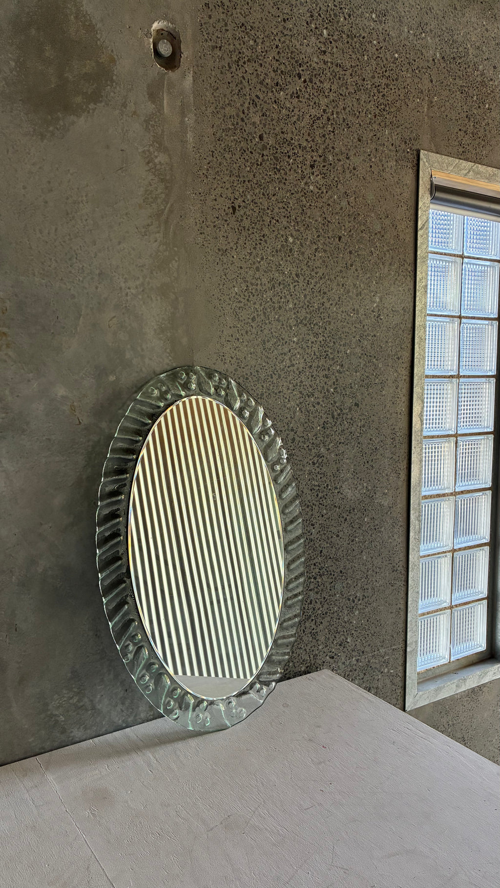 TEXTURED GLASS FRAMED MIRROR