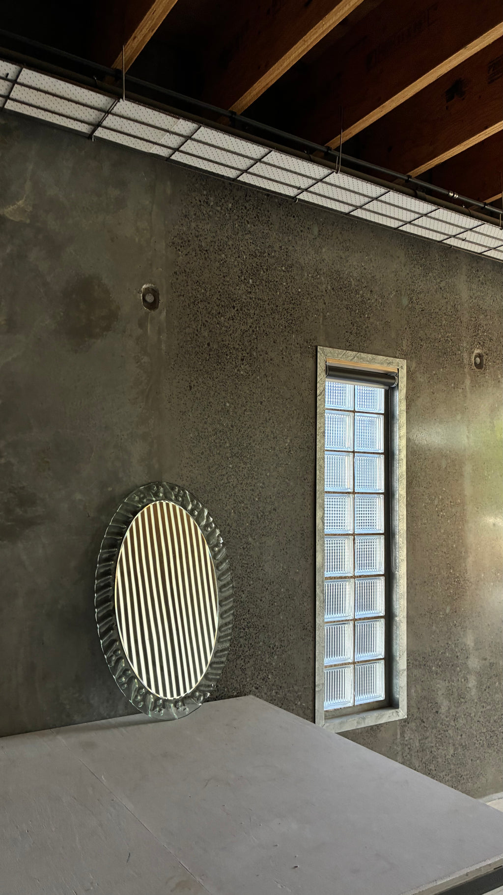TEXTURED GLASS FRAMED MIRROR