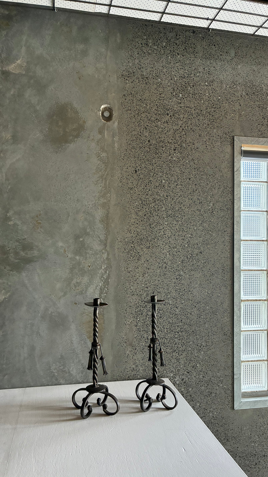 PAIR OF ANTIQUE FRENCH HAND-FORGED WROUGHT IRON CANDLESTICKS c.1910