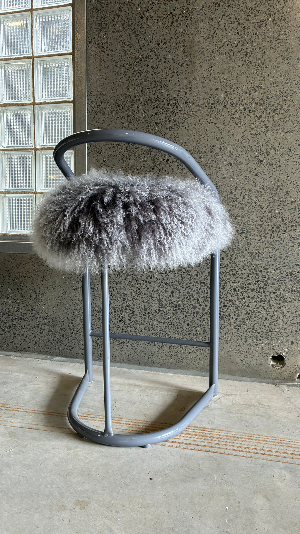 COUNTER STOOLS WITH MONGOLIAN UPHOLSTERY (PAIR)