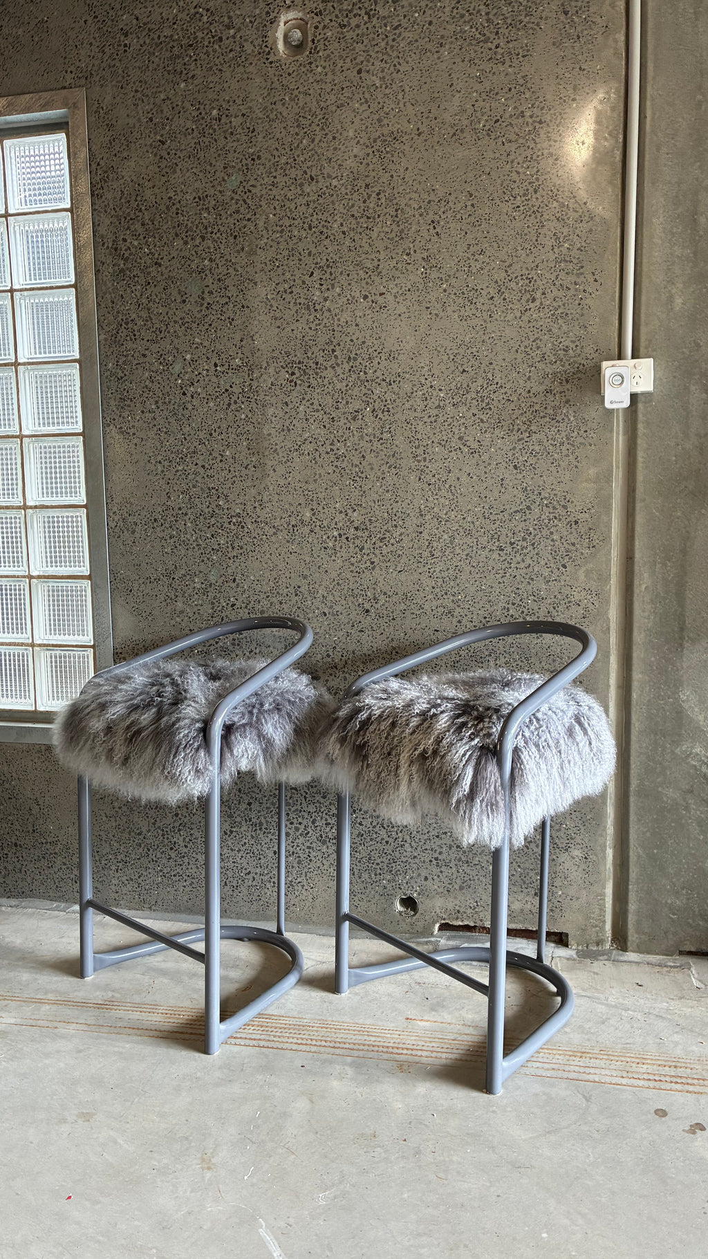 COUNTER STOOLS WITH MONGOLIAN UPHOLSTERY (PAIR)