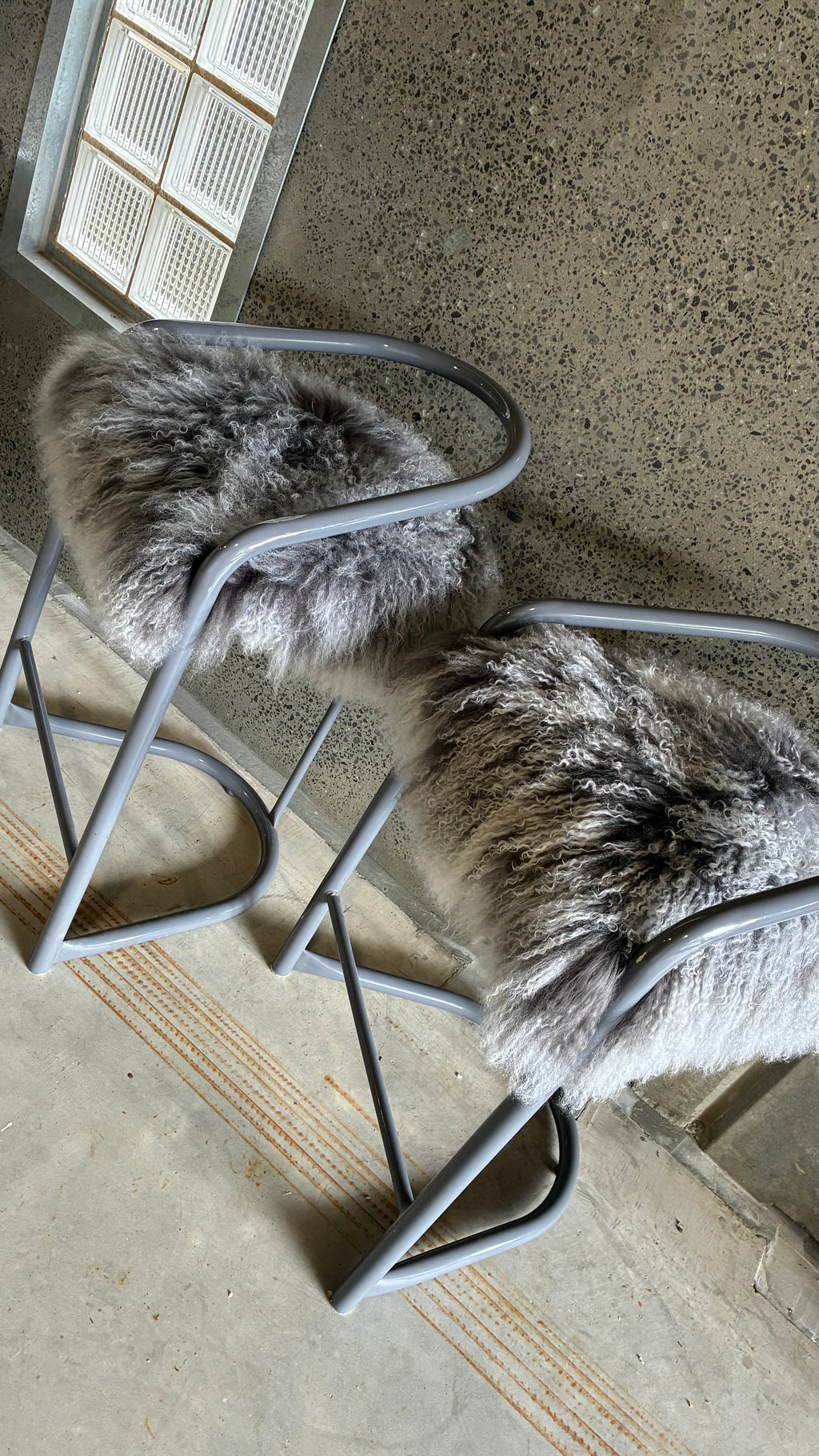 COUNTER STOOLS WITH MONGOLIAN UPHOLSTERY (PAIR)