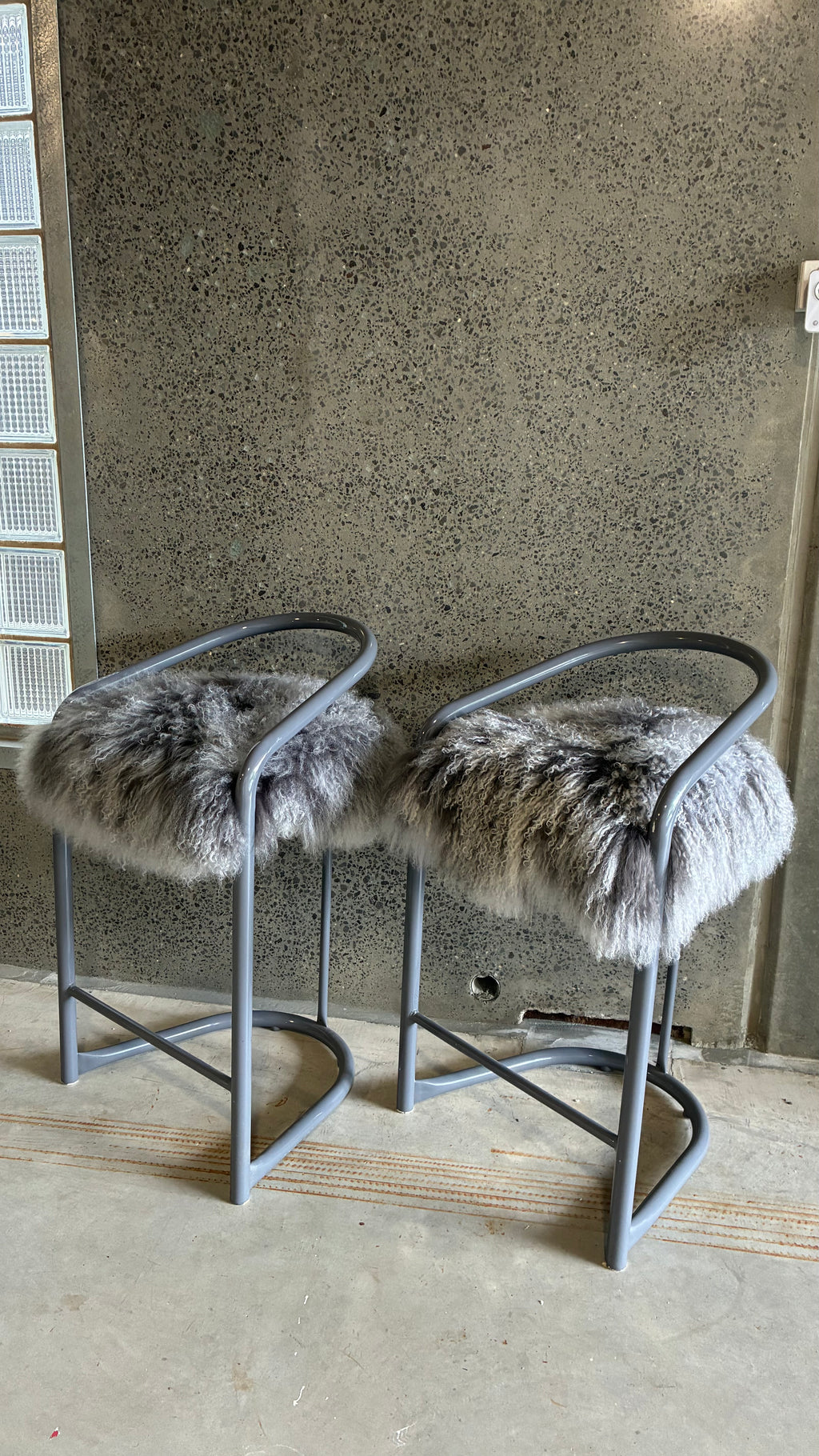 COUNTER STOOLS WITH MONGOLIAN UPHOLSTERY (PAIR)
