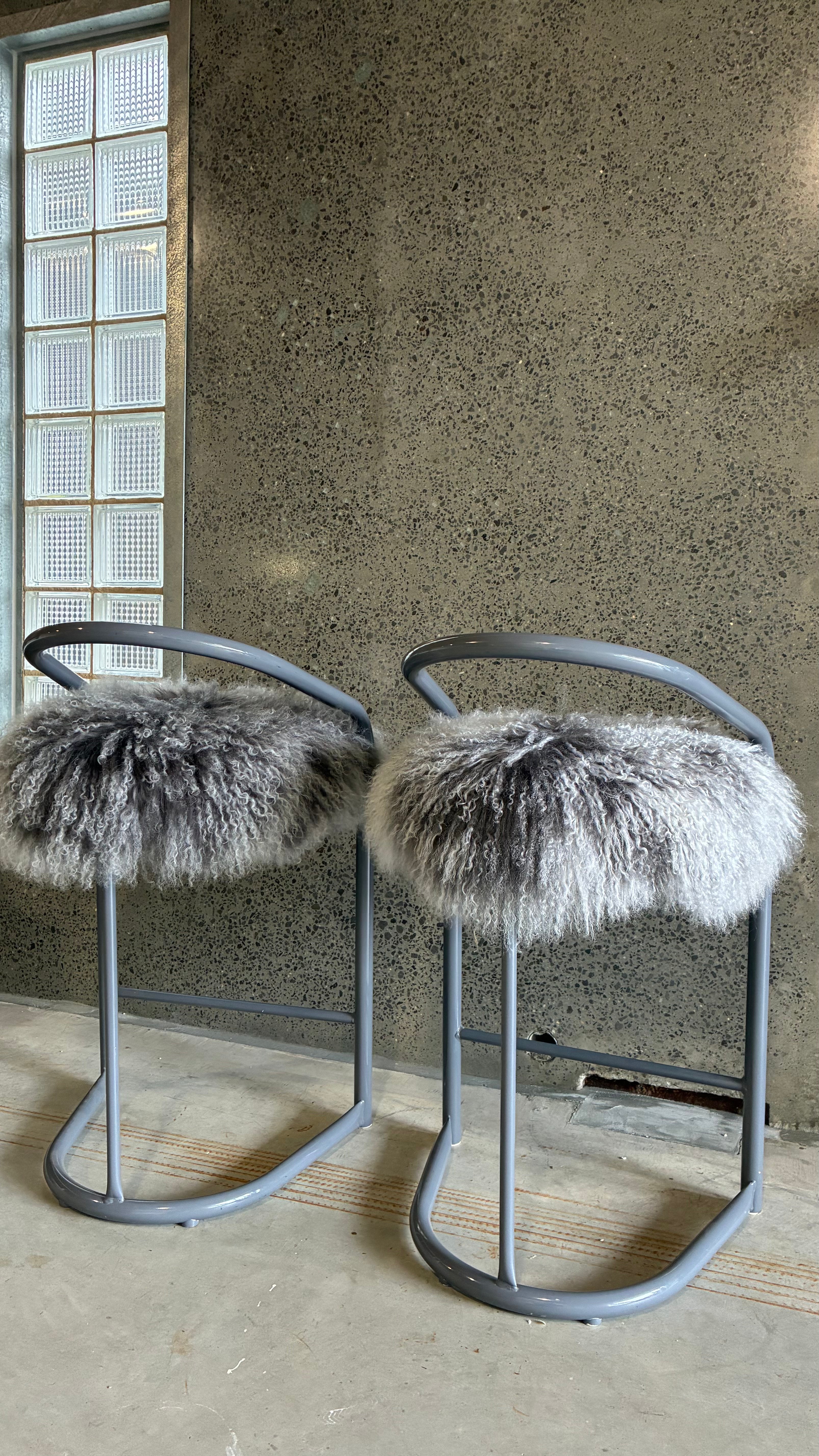 COUNTER STOOLS WITH MONGOLIAN UPHOLSTERY (PAIR)