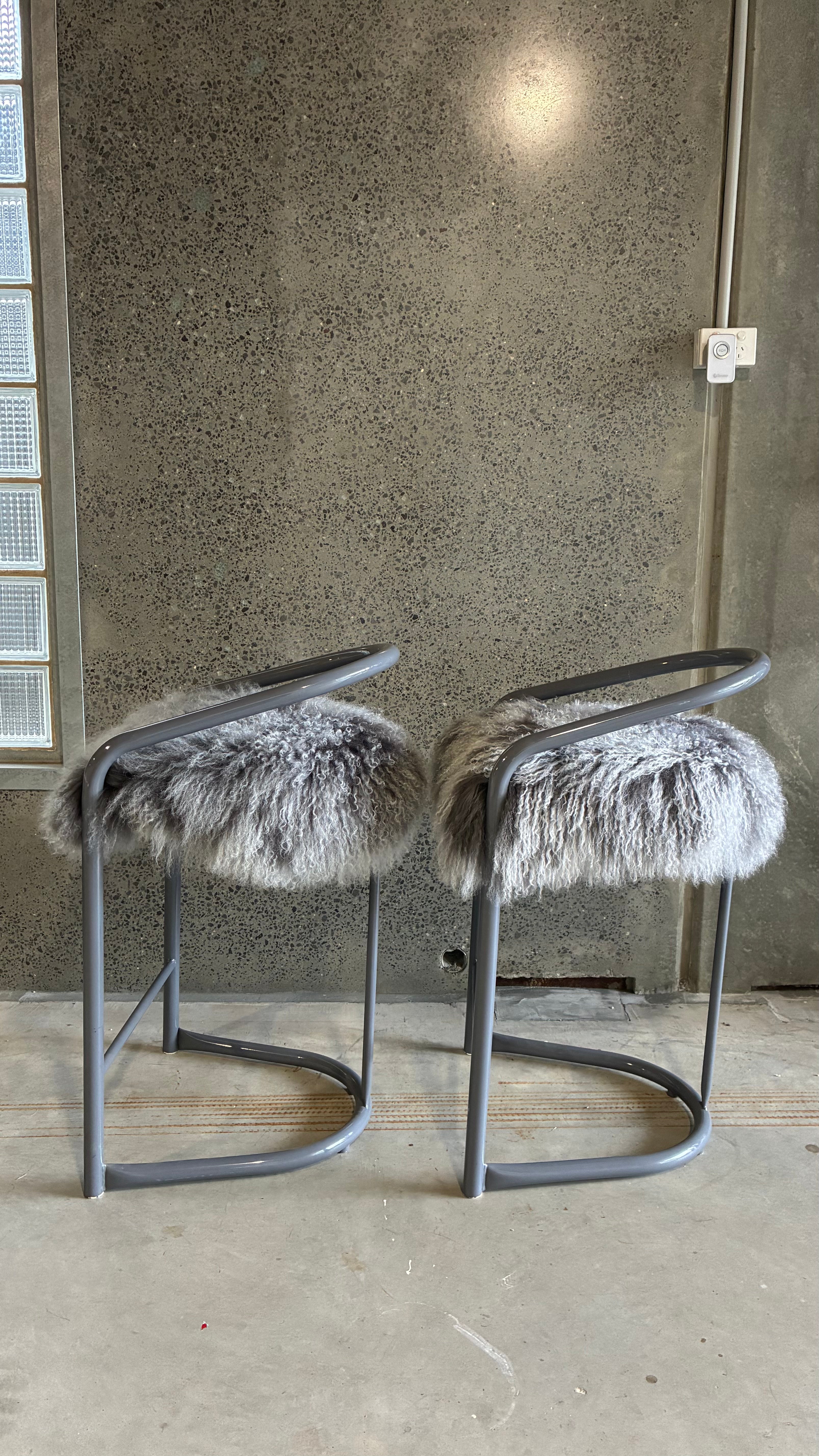 COUNTER STOOLS WITH MONGOLIAN UPHOLSTERY (PAIR)