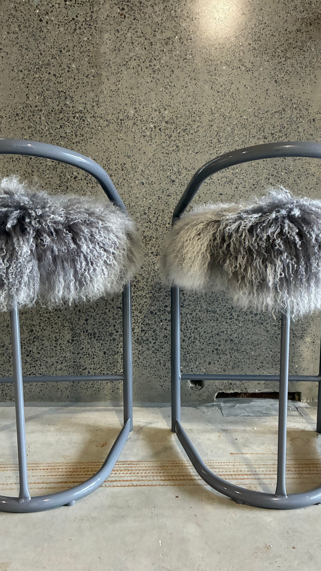 COUNTER STOOLS WITH MONGOLIAN UPHOLSTERY (PAIR)