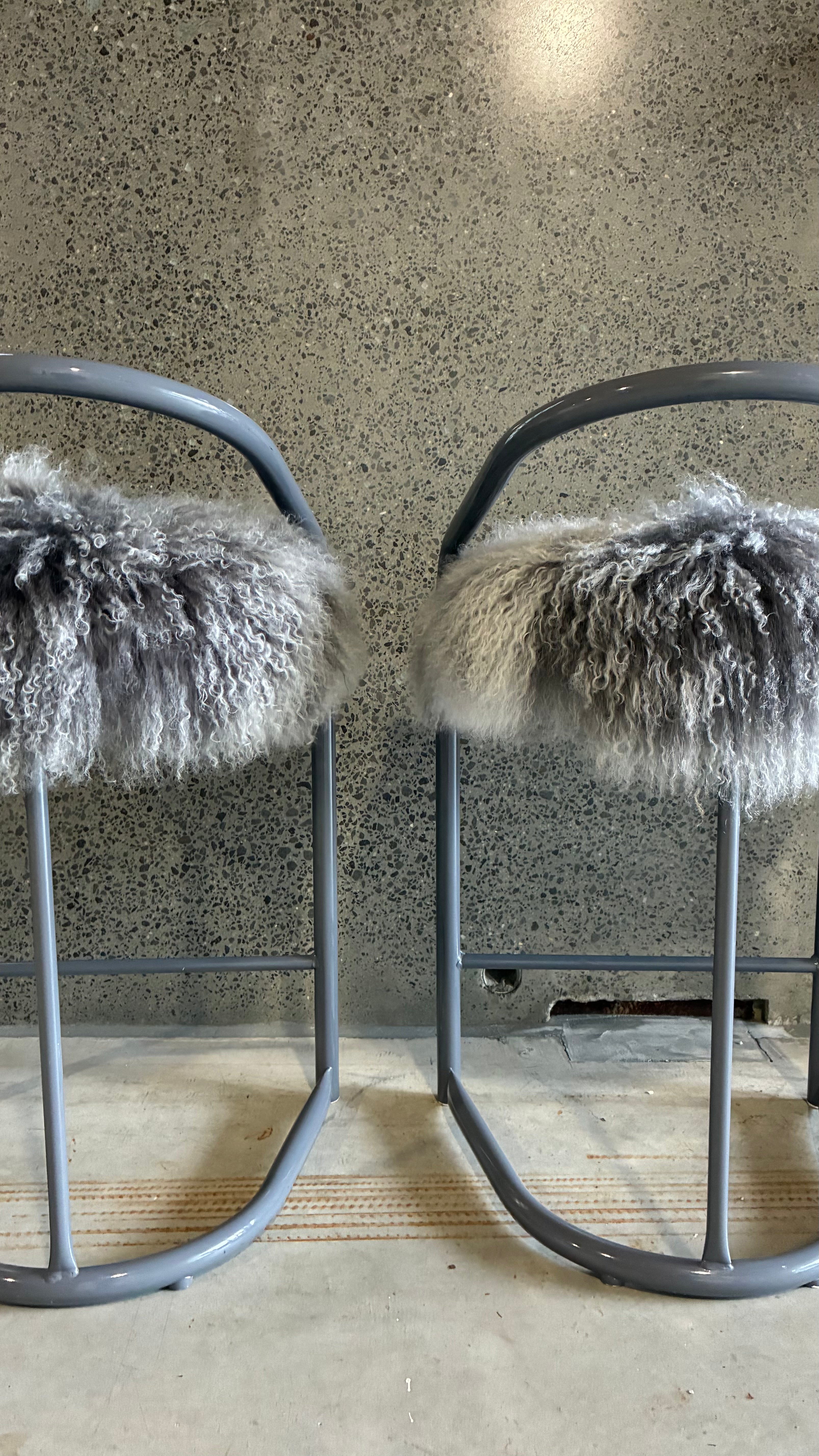 COUNTER STOOLS WITH MONGOLIAN UPHOLSTERY (PAIR)